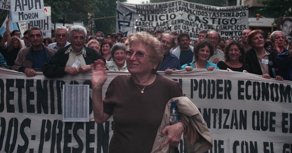 Rosa Tarlovsky de Roisinblit, mother of Patricia Julia Roisinblit, a victim of dictatorship-era state terror, joins a march for justice.