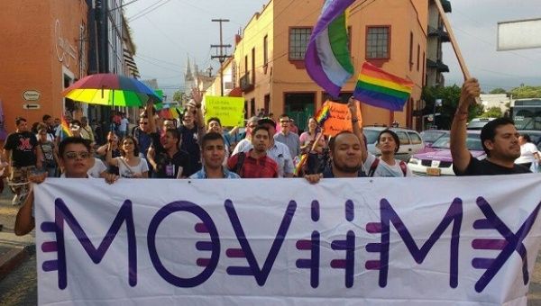 LGBTQ activists march down the streets of Cuernavaca, Mexico after the conclusion of the first-ever national meeting of activists, Aug. 27, 2016.