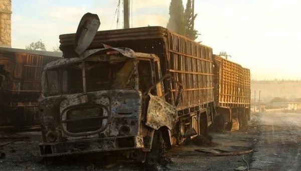 Damaged aid trucks are pictured after an airstrike on the rebel held Urm al-Kubra town, western Aleppo city, Syria September 20, 2016. 