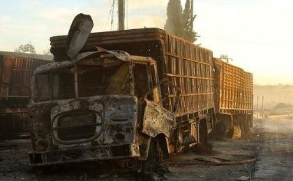 Damaged aid trucks are pictured after an airstrike on the rebel held Urm al-Kubra town, western Aleppo city, Syria September 20, 2016. 