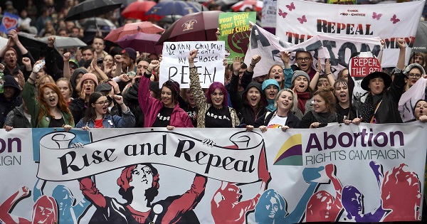 Demonstrators take part in a protest to urge the Irish Government to repeal strict limitations on a woman's right to an abortion, in Dublin, Sept. 24, 2016.