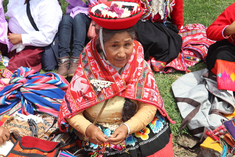 Dorotea Puma from Urubamba, a region of Cuzco, rests before the march. 