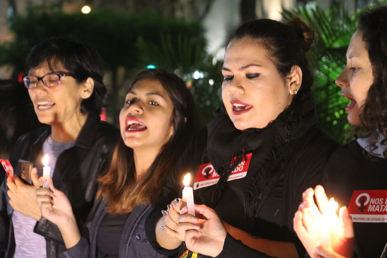 In Peru, women held a candlelight vigil to honor the thousands of women who are killed at the hands of men.