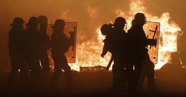 Riot Police Demolish Calais Refugee Camp