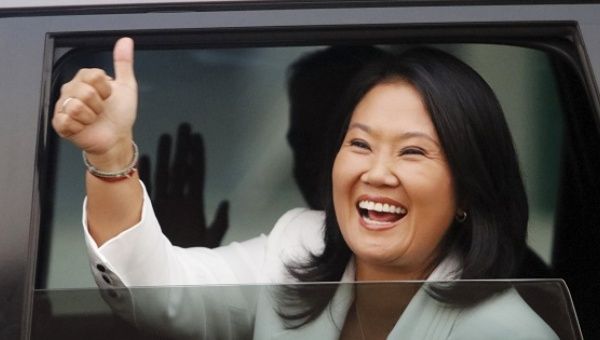 Peru's presidential candidate Keiko Fujimori gestures as she arrives for a presidential debate in Lima, Peru, April 3, 2016.