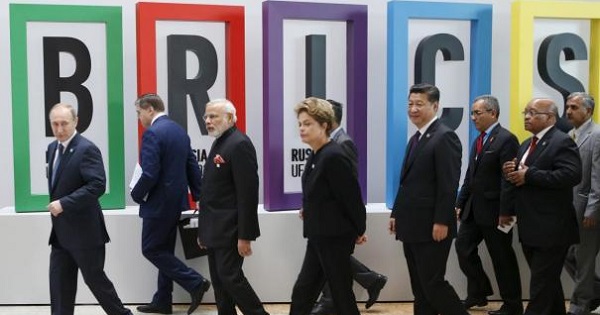 Russian President Vladimir Putin (L), Indian Prime Minister Narendra Modi (3rd L), Brazil's President Dilma Rousseff (C), Chinese President Xi Jinping (4th R) and South African President Jacob Zuma (2nd R) walk after the welcoming ceremony during the BRICS Summit in Ufa, Russia, July 9, 2015.