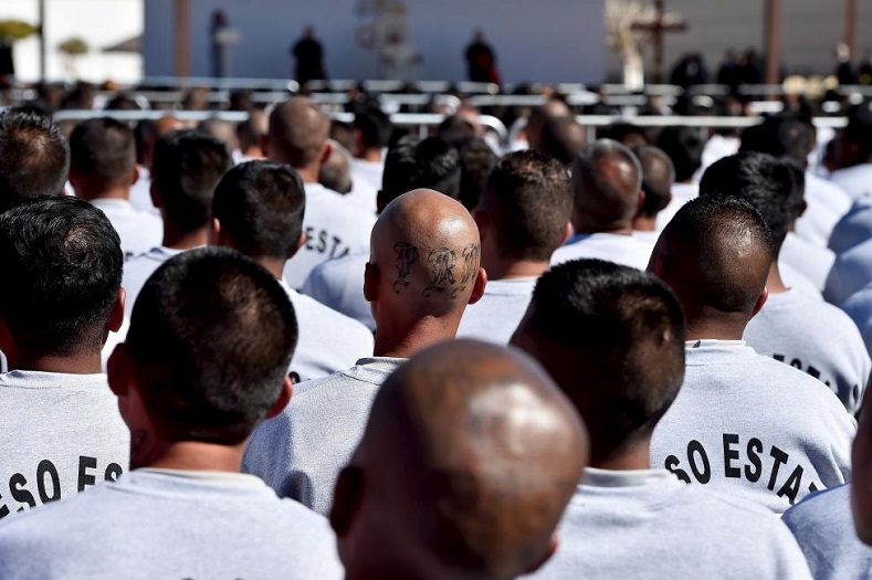 Inmates look on during the visit of Pope Francis to the CeReSo No. 3 penitentiary in Ciudad Juarez.