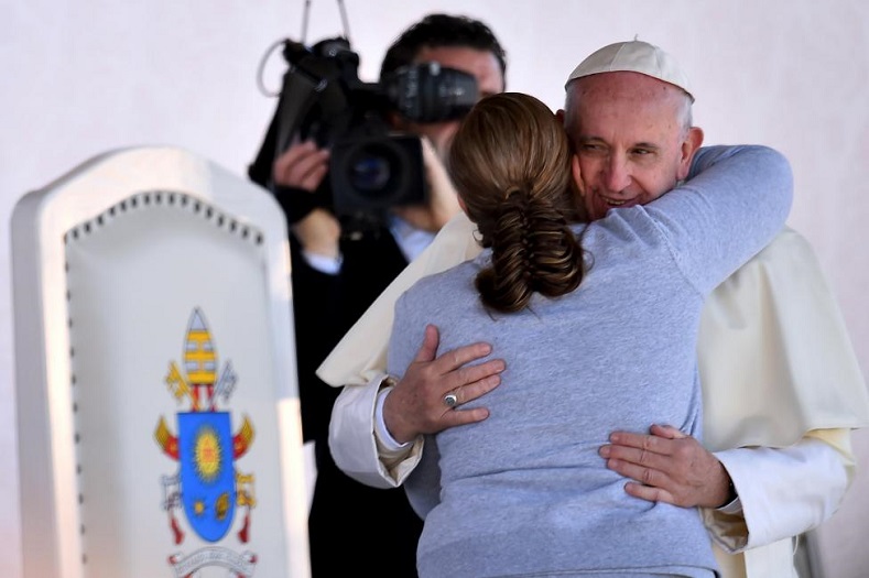 Pope Francis is greeted by a female inmate during his visit to the CeReSo No.3 penitentiary in Ciudad Juarez.