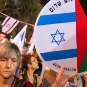 Israeli left-wing activists in Tel Aviv demanded fresh peace talks with Palestinians on the eve of the 20th anniversary of the killing of Prime Minister Yitzhak Rabin.