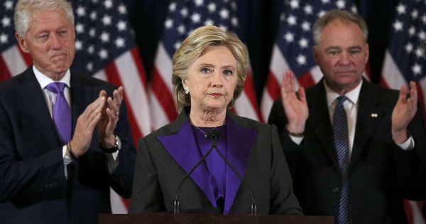 Hillary Clinton, accompanied by Bill Clinton and running mate Tim Kaine, speaks about the results of the U.S. election at a hotel in New York, Nov. 9, 2016.