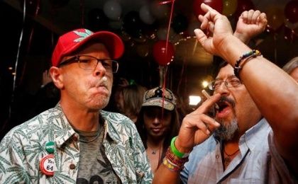 William Britt (L) and Al Moreno (R) celebrate after Californians voted to pass Prop 64, legalizing recreational use of marijuana in the state, in Los Angeles, California, U.S. Nov. 8, 2016. 