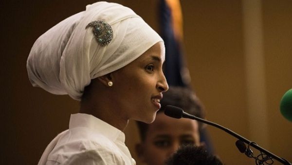 Ilhan Omar, a candidate for State Representative for District 60B in Minnesota, gives an acceptance speech on election night.