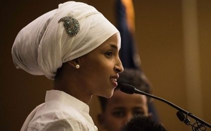 Ilhan Omar, a candidate for State Representative for District 60B in Minnesota, gives an acceptance speech on election night.