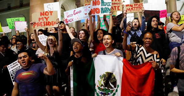 Demonstrators protest outside of City Hall following the election of Republican Donald Trump as president of the United States in downtown Los Angeles, California.