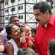 President Nicolas Maduro is greeted by supporters at an event to celebrate the over one million housing units built by the government, Trujillo, Venezuela, Nov. 10, 2016.