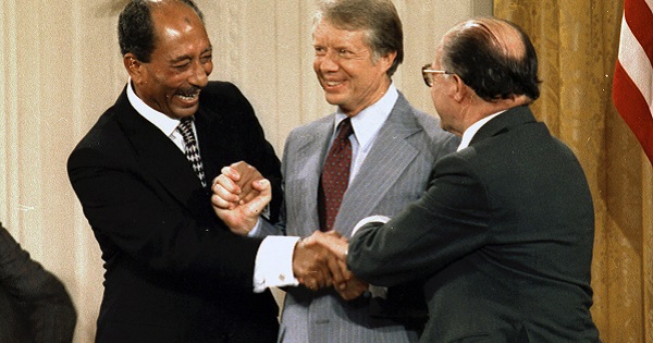 Anwar Sadat, Jimmy Carter and Menachem Begin at the White House after the signing of the peace treaty between Egypt and Israel on March 26, 1979.