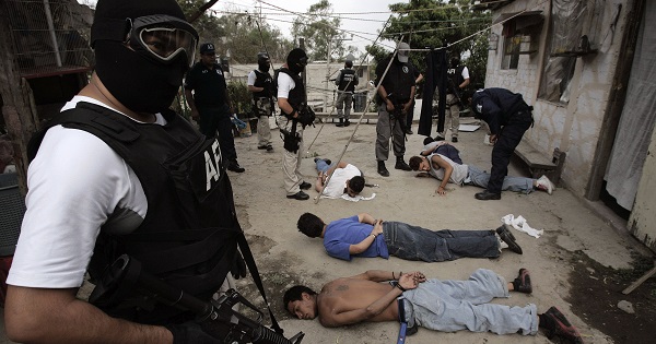 Mexican Federal Police arrest men on suspicion of possessing drugs, Alvaro Obregon district, Mexico City, May, 2007.