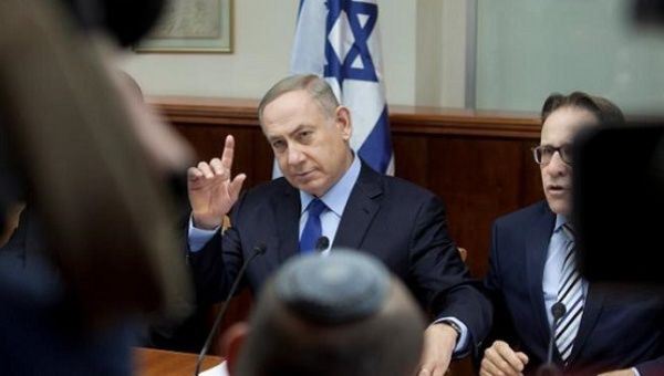 Israeli Prime Minister Benjamin Netanyahu attends a weekly cabinet meeting at his Jerusalem office December 25, 2016. 