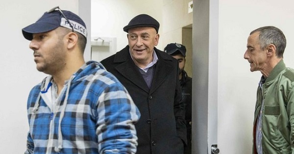 Israeli Knesset member Basel Ghattas (C) arrives at the Magistrates Court in Rishon Lezion, Israel Dec. 23, 2016.