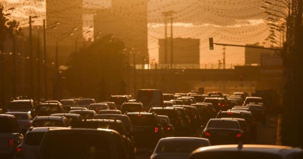 Cars are stuck in a traffic jam during sunset in Moscow, Russia, June 4, 2015.