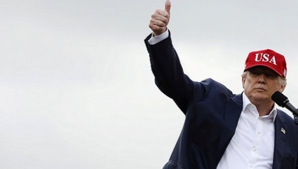 U.S. President-elect Donald Trump gestures during a USA Thank You Tour event in Mobile, Alabama, U.S., December 17, 2016