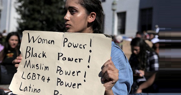 Berkeley High student Ariana Melton, 16, holding a sign during a protest in response to the election of Donald Trump, Berkely, California, Nov. 9, 2016.