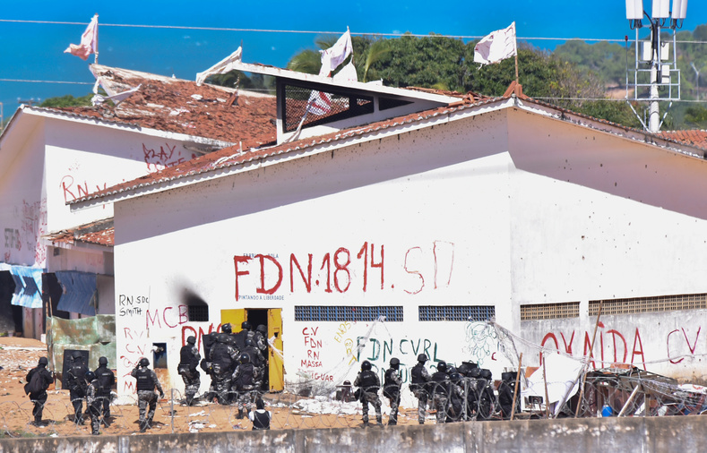 Riot police enter at the Alcacuz prison during an uprising in Natal, Rio Grande do Norte state.