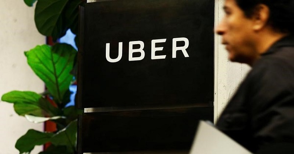 A man exits the Uber offices in Queens, New York.