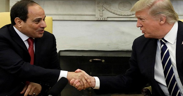 U.S. President Donald Trump shakes hands with Egyptian President Abdel Fattah el-Sissi in the Oval Office of the White House.