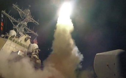 USS Porter launches a Tomahawk  missile in the Mediterranean Sea during Wednesday's attack on Syria. April 6, 2017