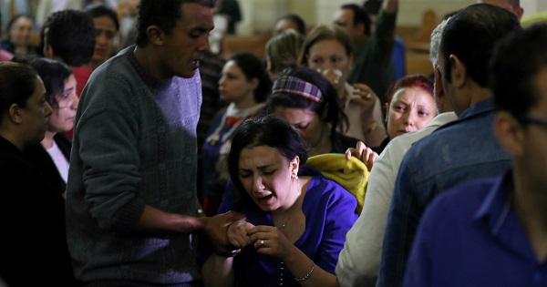 A relative of a victim reacts inside the Coptic church that was bombed in Tanta, Egypt, April 9, 2017.