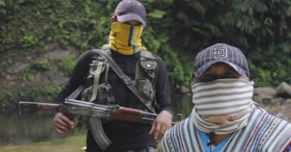 Members of a right-wing paramilitary group deliver a message in a self-released video.