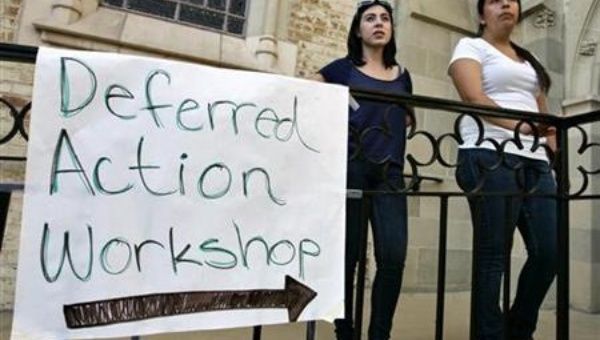 Undocumented UCLA students Alejandra Gutierrez (L) and Miriam Gonzales (R) attend a workshop for the Deferred Action for Childhood Arrivals program in Los Angeles, California, August 15, 2012