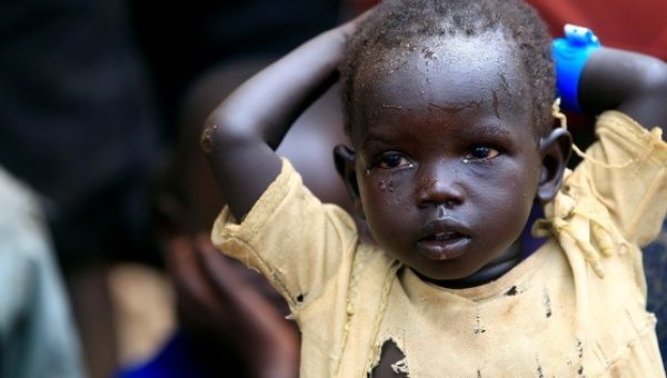 A child displaced due to fighting in South Sudan arrives in Lamwo after fleeing fighting in Pajok town across the border in northern Uganda, April 5, 2017.