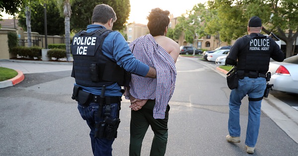 A ICE official arrests an Iranian immigrant in San Clemente, California, on May 11, 2017.