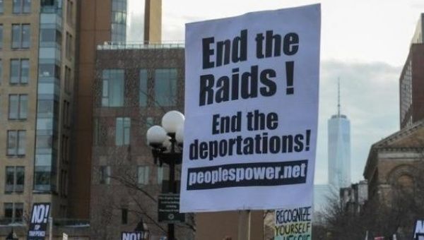 People participate in a protest against President Donald Trump's immigration policy and the recent Immigration and Customs Enforcement (ICE) raids in New York City, Feb. 11, 2017.