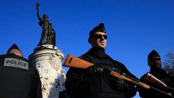 French police stand guard in Paris.