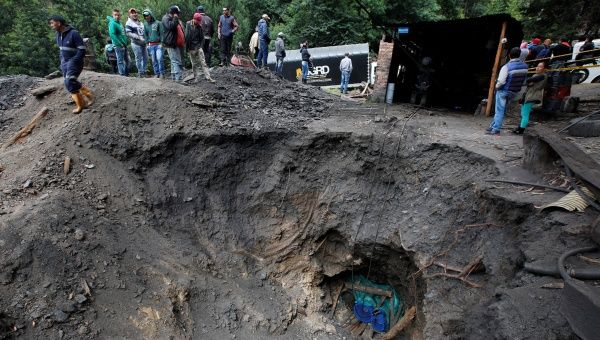 People wait for news of their missing relatives after an explosion at an underground coal mine on Friday, in Cucunuba, Colombia June 24, 2017.