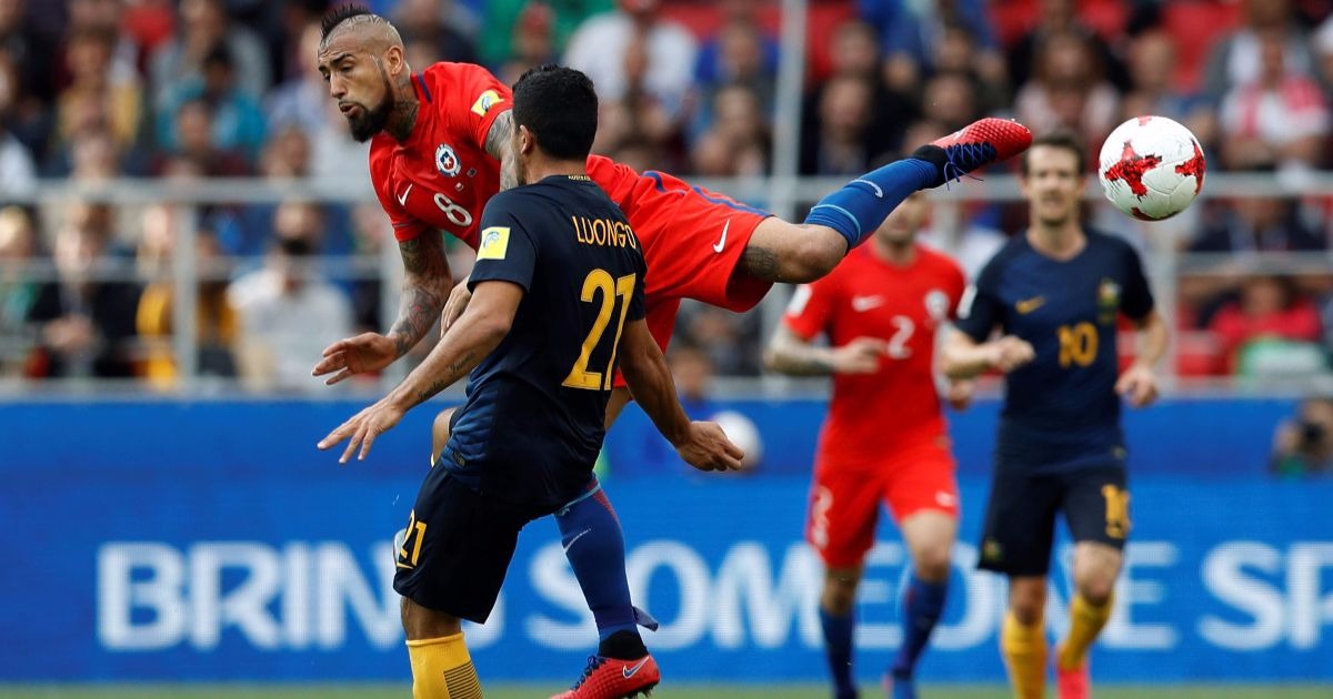 FIFA Confederations Cup Russia 2017 - Group B - Spartak Stadium, Moscow, Russia - June 25, 2017 Chile’s Arturo Vidal in action with Australia’s Massimo Luongo.