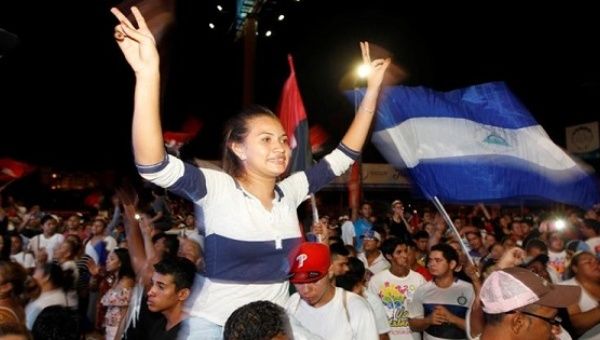 Supporters of Nicaragua's President Daniel Ortega flock to the streets of the capital to celebrate his victory.