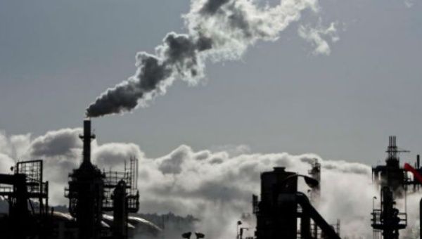 Smoke is released into the sky at a refinery in Wilmington, California.