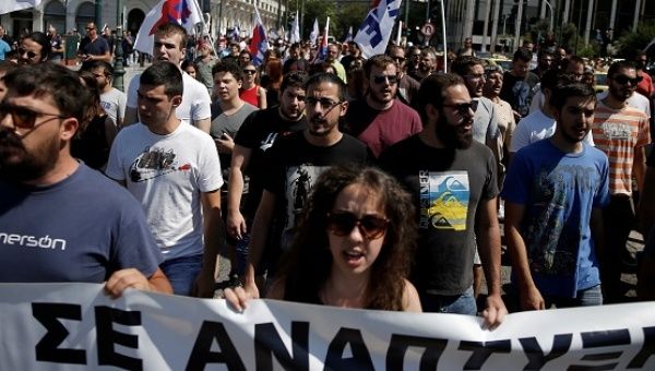 Protesters shout slogans during a 24-hour strike by employees of hotels and restaurants, in Athens, Greece, on July 20, 2017.