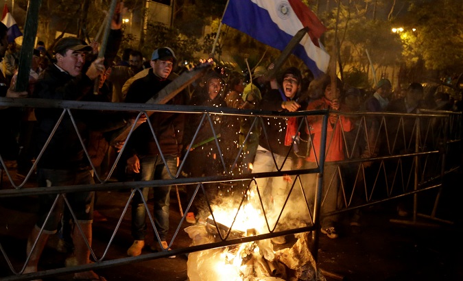 Farm workers protest against government policies in Asuncion, the capital of Paraguay