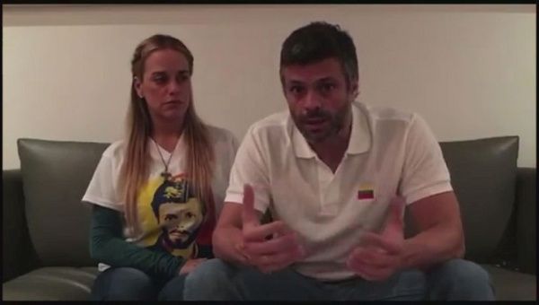 Leopoldo Lopez and his wife Lilian Tintori talking in their house in Caracas, Venezuela on July 17, 2017