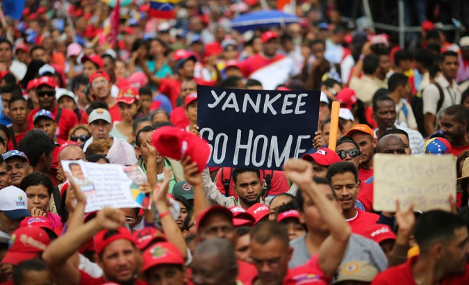 Venezuelan citizens march in support of President Nicolas Maduro.