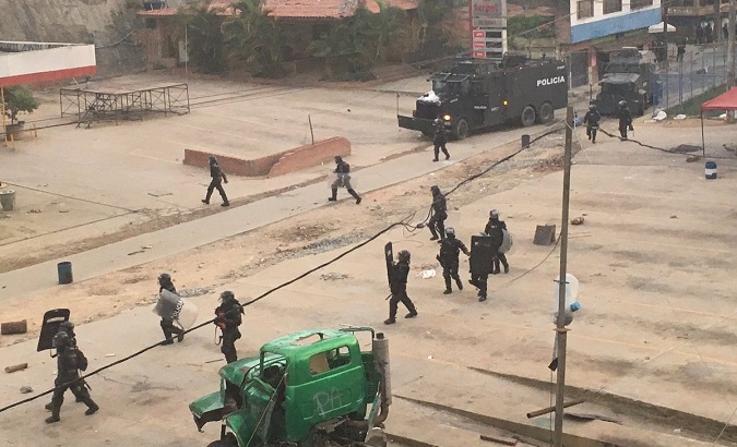 Esmad police clash with miners during a protest in Segovia, Antioquia