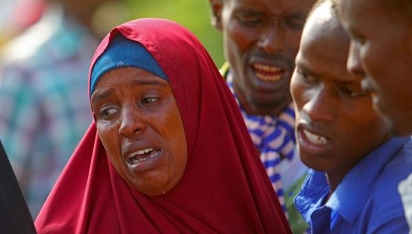 Relatives mourn following a deadly attack by U.S. and Somali forces that took the lives of 10, including three children.