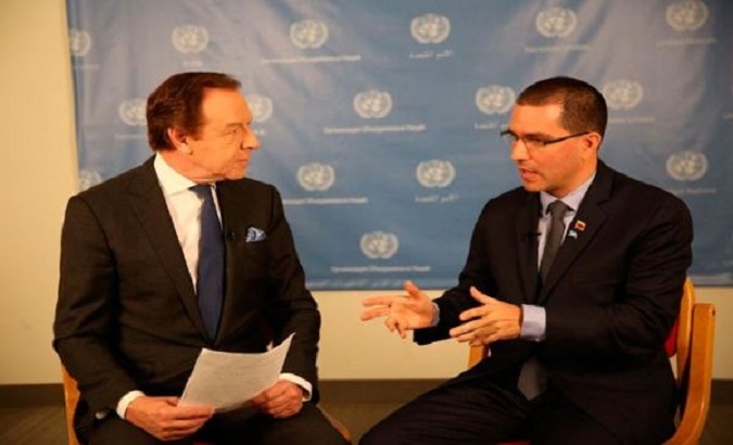 teleSUR host Jorge Gestoso with Venezuelan Foreign Minister Jorge Arreaza.