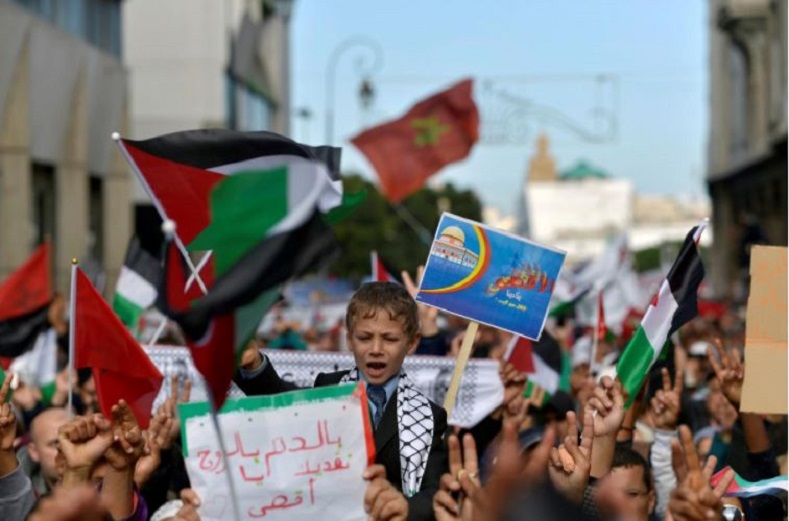 Moroccans picked up the banner in separate protests around the city of Rabat Sunday.