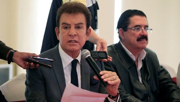 Salvador Nasralla, presidential candidate for the Opposition Alliance, speaks during a news conference with former Honduran president Manuel Zelaya.